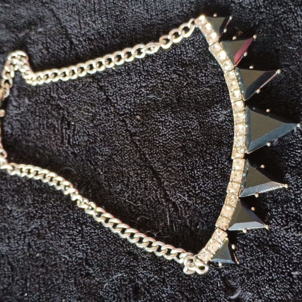 Silver tone necklace rhinestone center and plastic triangles